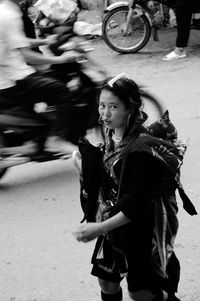 Woman walking on street