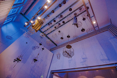 High angle view of illuminated light bulb on table at home