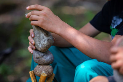 Close-up of hand holding hands