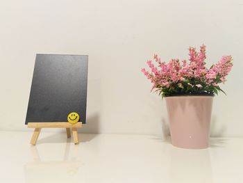 Flower vase on table at home