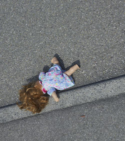 High angle view of doll on street