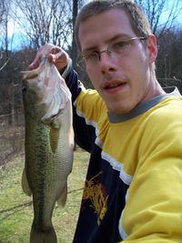 Portrait of man holding fish