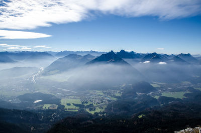 Aerial view of mountains against sky