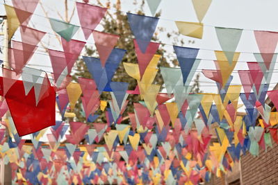 0130 colorful festive decoration-pennant garlands or buntings. street in hotan-xinjiag-china.