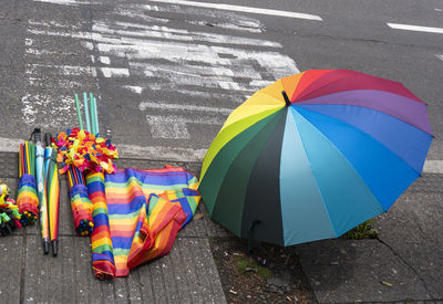 High angle view of multi colored umbrellas on street