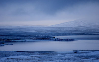 Scenic view of snow covered landscape