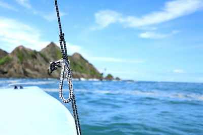 View of sailboat in sea against sky