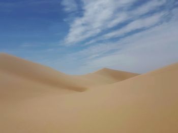 Scenic view of desert against sky