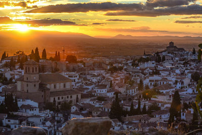 High angle view of townscape against sky during sunset