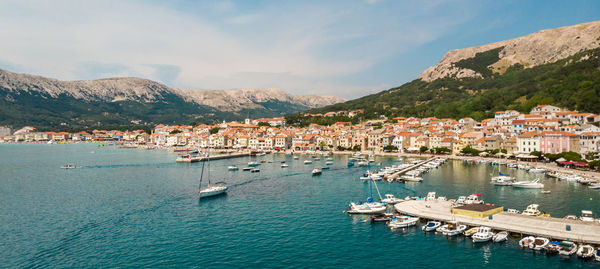 High angle view of sailboats moored in harbor