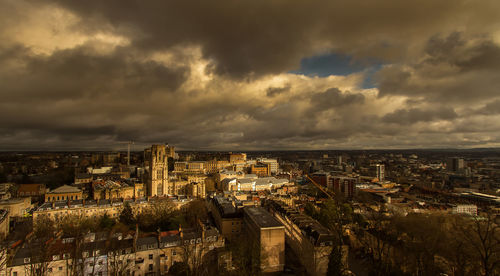 High angle view of townscape against cloudy sky