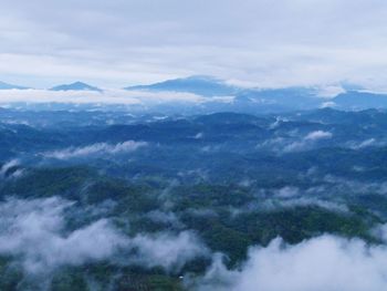 Aerial view of mountains against sky