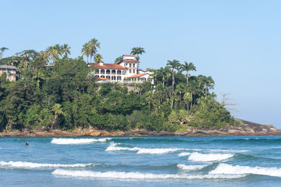 Scenic view of sea against clear sky