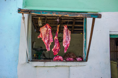 Meat hanging at butcher shop