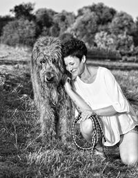 Portrait of woman with pet irish wolfhound