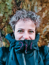 Portrait of woman wearing warm clothing during 
winter