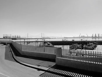 Bridge over river against clear sky