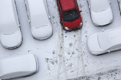 High angle view of frozen cars on road