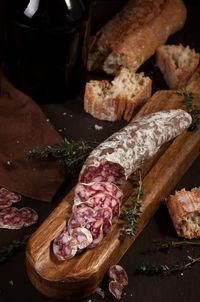 Close-up of meat on cutting board