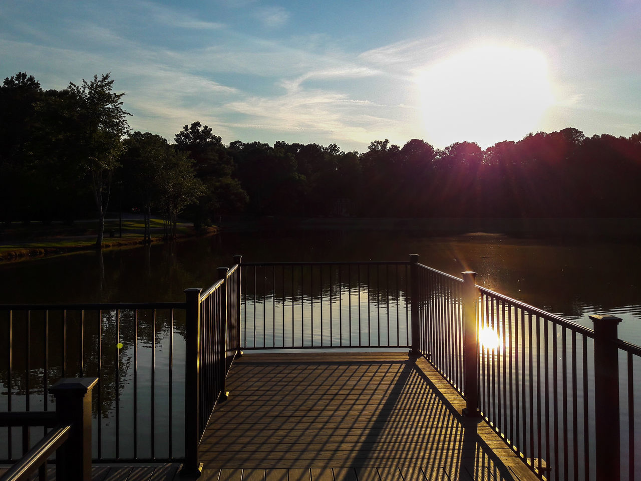 VIEW OF LAKE AGAINST SKY DURING SUNSET