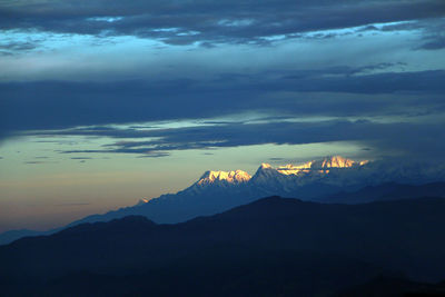 Scenic view of mountains against sky during sunset