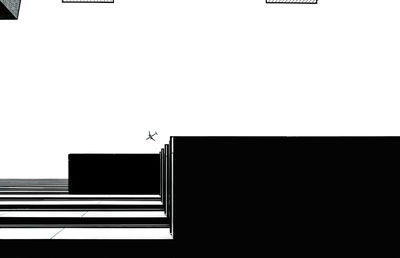 Low angle view of building against plan in clear sky