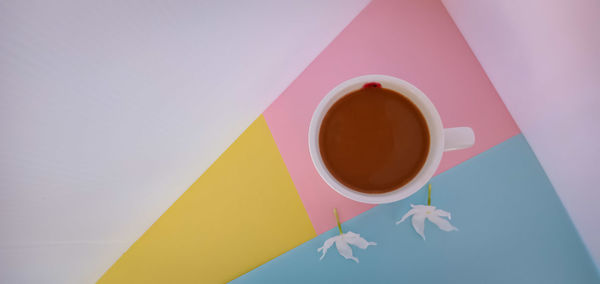 High angle view of coffee cup on table