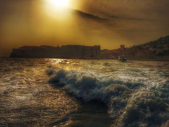 Scenic view of sea against sky during sunset
