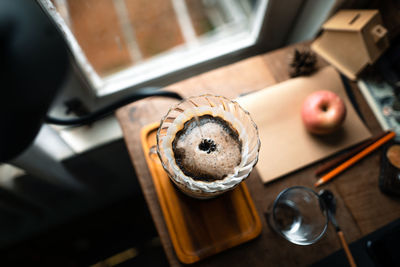 High angle view of coffee cup on table