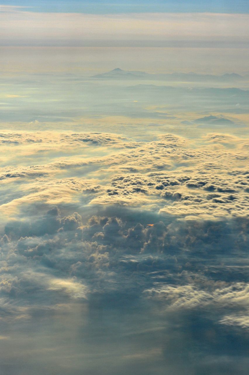 AERIAL VIEW OF CLOUDS OVER SEA