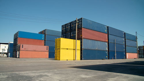 Low angle view stack of containers.