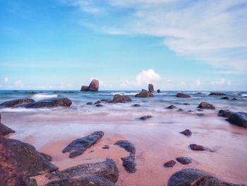 Scenic view of sea against blue sky