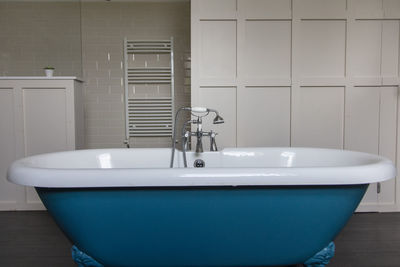 Close-up of faucet in bathroom