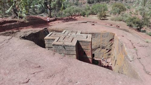 High angle view of abandoned messy land in forest