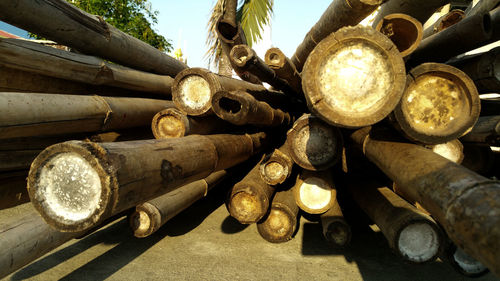 Close-up of old stack on wood