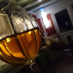 Close-up of beer glass on table