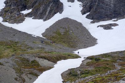 High angle view of snow covered mountain against sky