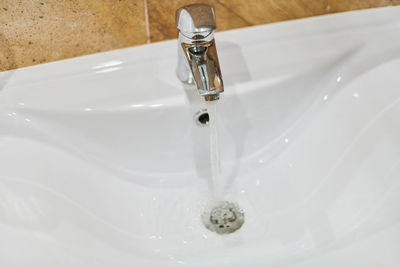 High angle view of faucet in bathroom