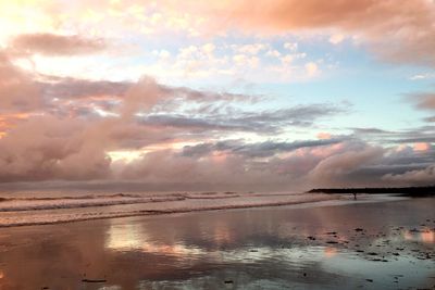 Scenic view of sea against dramatic sky