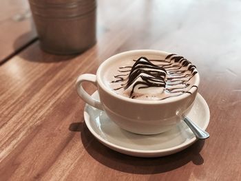 Cup of coffee on table