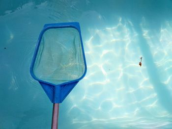 High angle view of swimming in pool