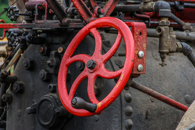 Close-up of steering wheel on steam train