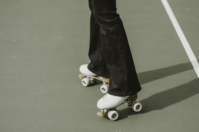 Low section of man skateboarding on skateboard