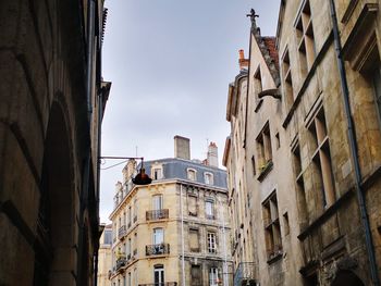 Low angle view of buildings against sky