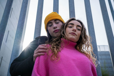 Portrait of young woman looking away