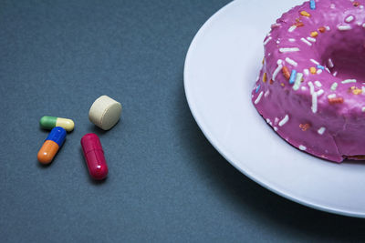 Close-up of multi colored candies on table