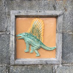 Close-up of lizard on wall