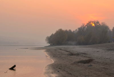 Scenic view of danube river against sky during sunset