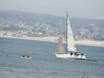 Boats sailing in sea