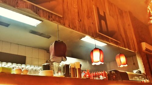 Low angle view of illuminated lamp